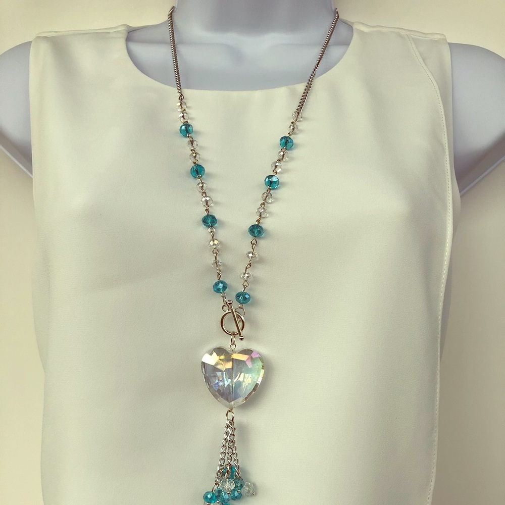 Gorgeous necklace with crystal beads and pendant.